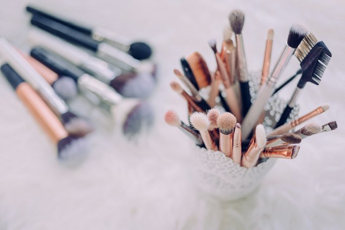 Clean makeup brushes standing in holders